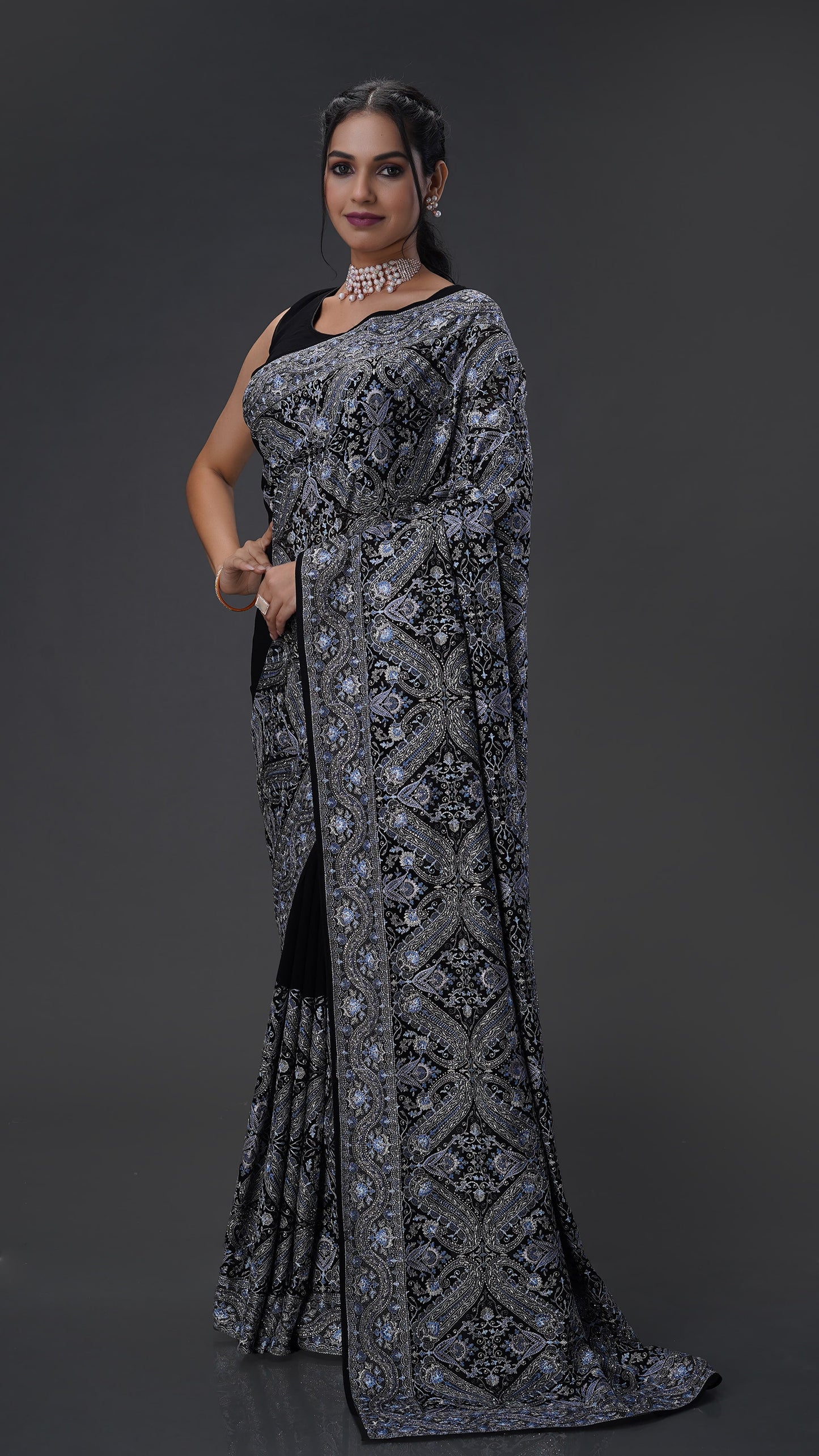 Elegant Black Georgette Saree Adorned with Sparkling Stones