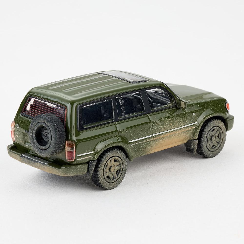 1:64 1994 Toyota Land Cruiser LC80 Die-Cast Car - Military Green Muddy Edition
