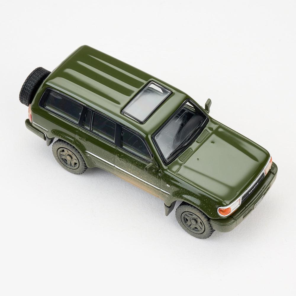 1:64 1994 Toyota Land Cruiser LC80 Die-Cast Car - Military Green Muddy Edition