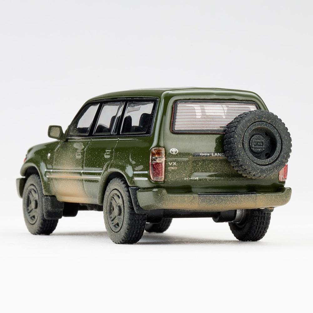 1:64 1994 Toyota Land Cruiser LC80 Die-Cast Car - Military Green Muddy Edition