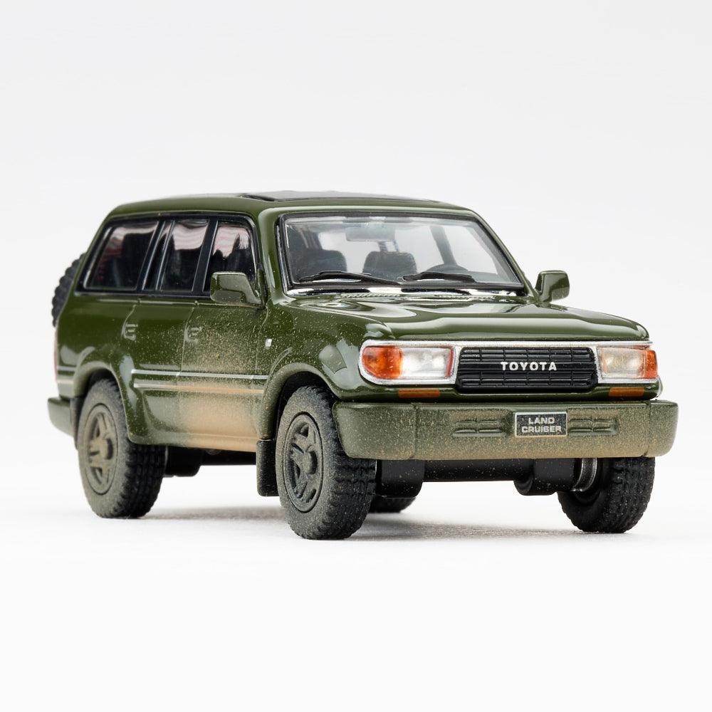 1:64 1994 Toyota Land Cruiser LC80 Die-Cast Car - Military Green Muddy Edition